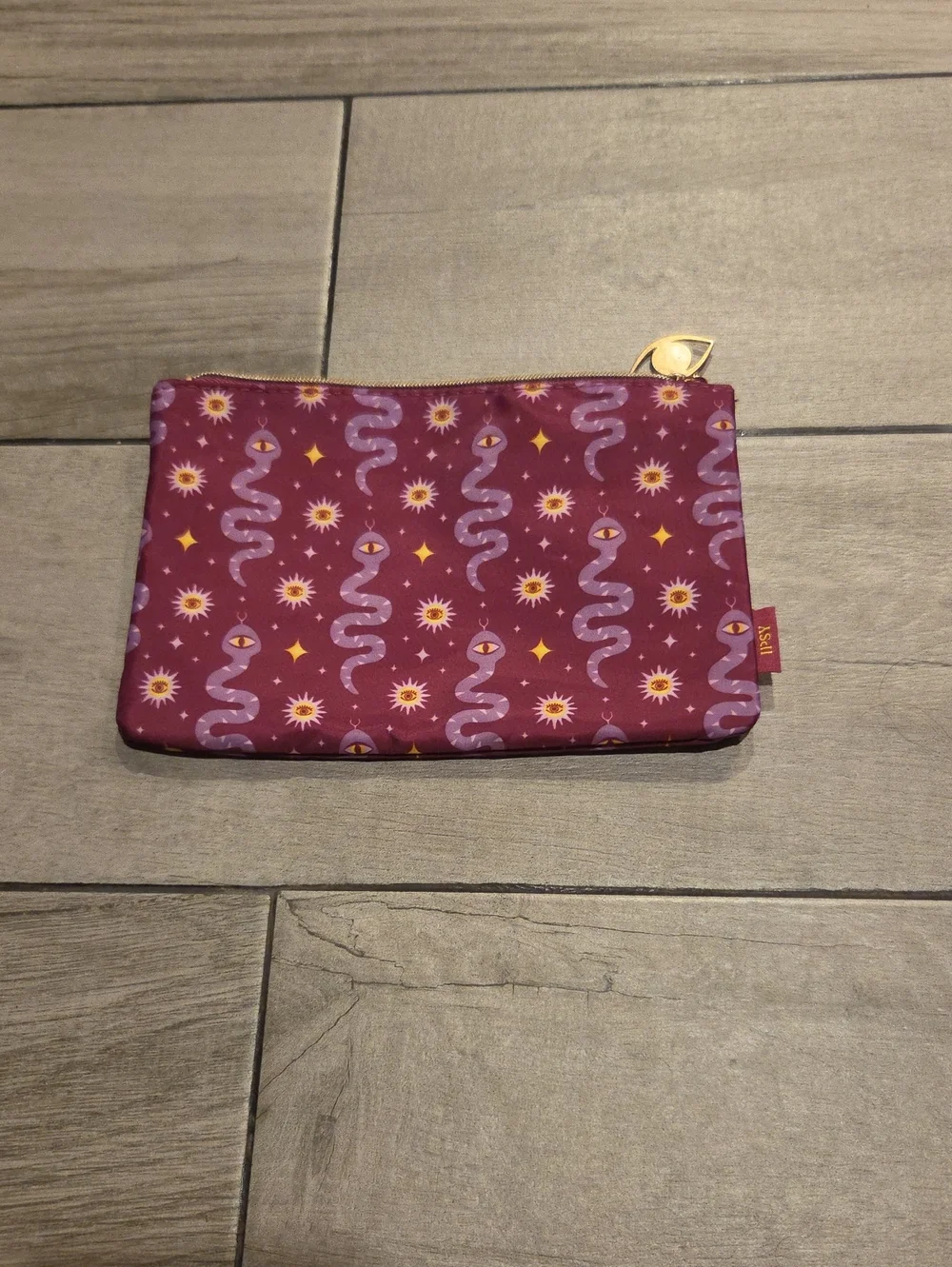 ipsy Burgundy Cosmetic Bag with Lavender Snake Pattern and Gold Zip